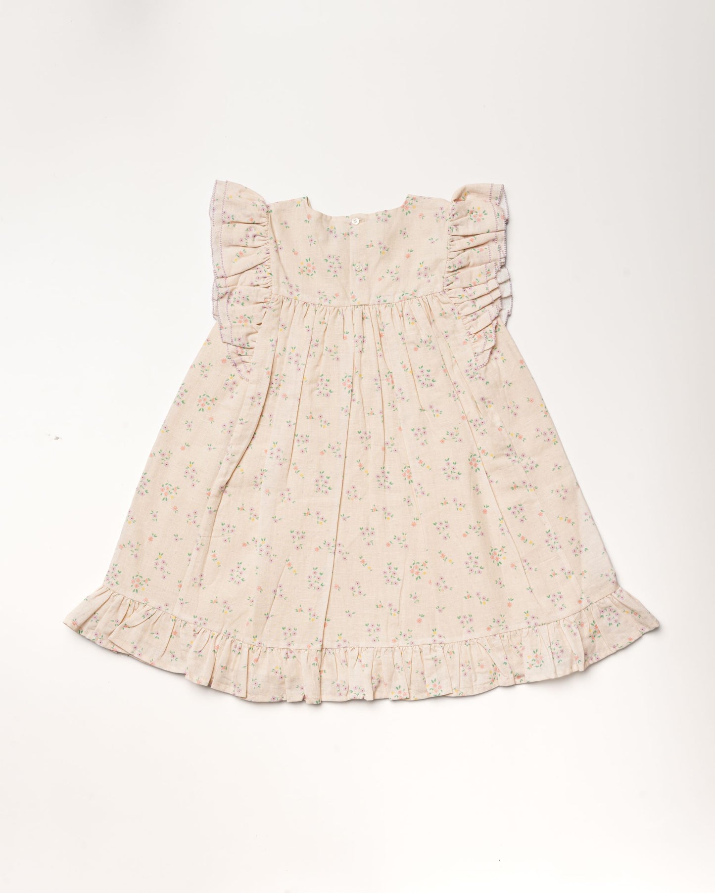 Early Sunday, Sita Dress in Painted Bouquet print, made from 70% Cotton 30% Linen fabric, featuring a sleeveless design with wide shoulder straps & a delicate lace yoke, shown in a back flat-lay view