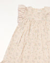 Early Sunday, Sita Dress in Painted Bouquet print, made from 70% Cotton 30% Linen fabric, featuring a sleeveless design with wide shoulder straps & a delicate lace yoke, shown in a closeup flat-lay view