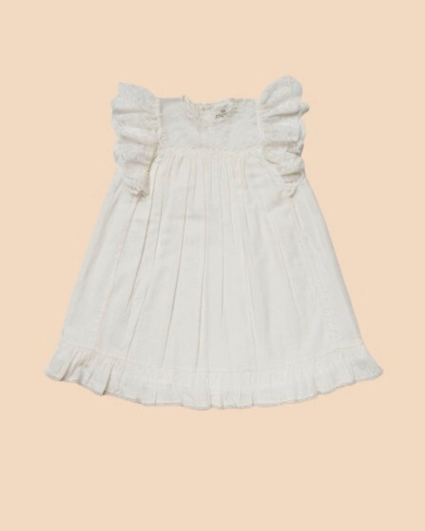 Early Sunday, Sita Dress in Ivory color, made from Tiny Swiss Dobby fabric, featuring a sleeveless design with wide shoulder straps & a delicate lace yoke, shown in a front flat-lay view