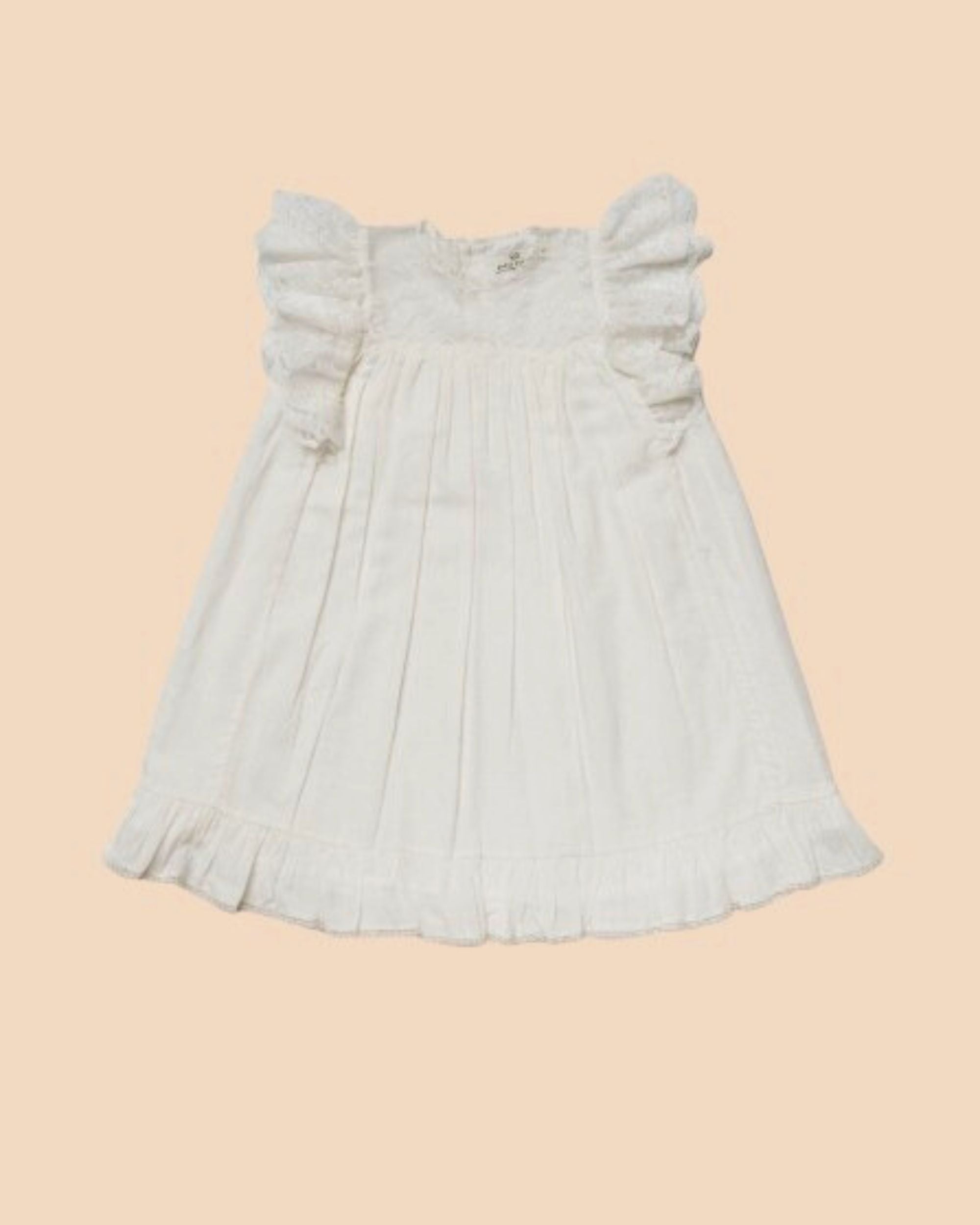 Early Sunday, Sita Dress in Ivory color, made from Tiny Swiss Dobby fabric, featuring a sleeveless design with wide shoulder straps & a delicate lace yoke, shown in a front flat-lay view