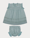 Early Sunday, Susie Baby Dress & Bloomer in Sea Dream color, made from All-Over Eyelet Embroidered Cotton Schifflie fabric, featuring flared dress with a relaxed fit for ease of movement, matching bloomer with an elasticated waistband for comfort and flexibility, shown in a front flat-lay view