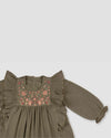 Early Sunday, Suzanne Dress in Dried Leaf, made from Cotton Double Gauze fabric, featuring classic silhouette with floral embroidery around the yoke and ruffle detailing, shown in a closeup flat-lay view