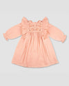 Early Sunday, Suzanne Dress in Dusty Pink, made from Cotton Double Gauze fabric, featuring classic silhouette with floral embroidery around the yoke and ruffle detailing, shown in a front flat-lay view