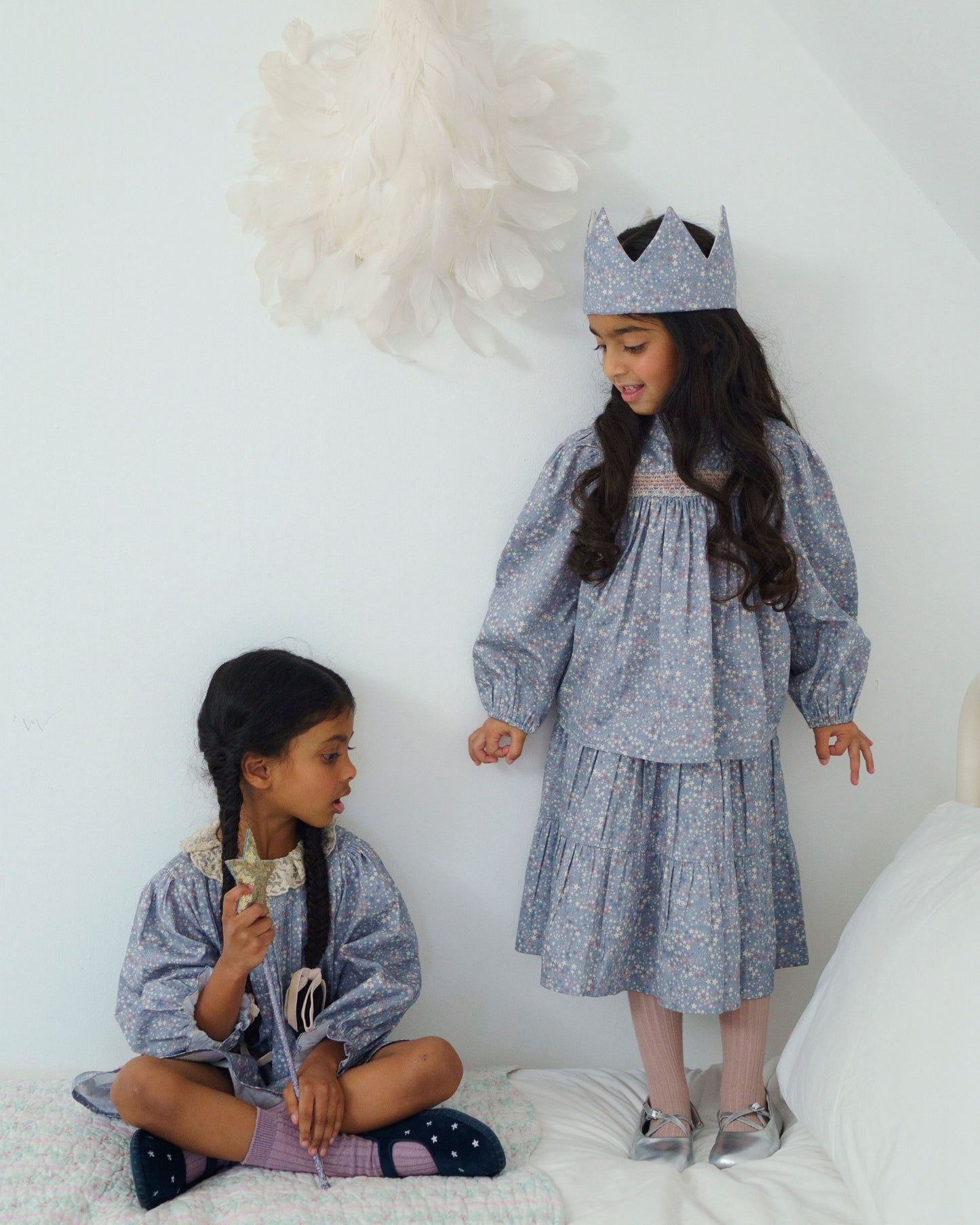 Early Sunday, Victoria Skirt in Celestial print, made from Printed Cotton Satin fabric, featuring Tiered silhouette for natural movement and volume, shown in a front view of model wearing it