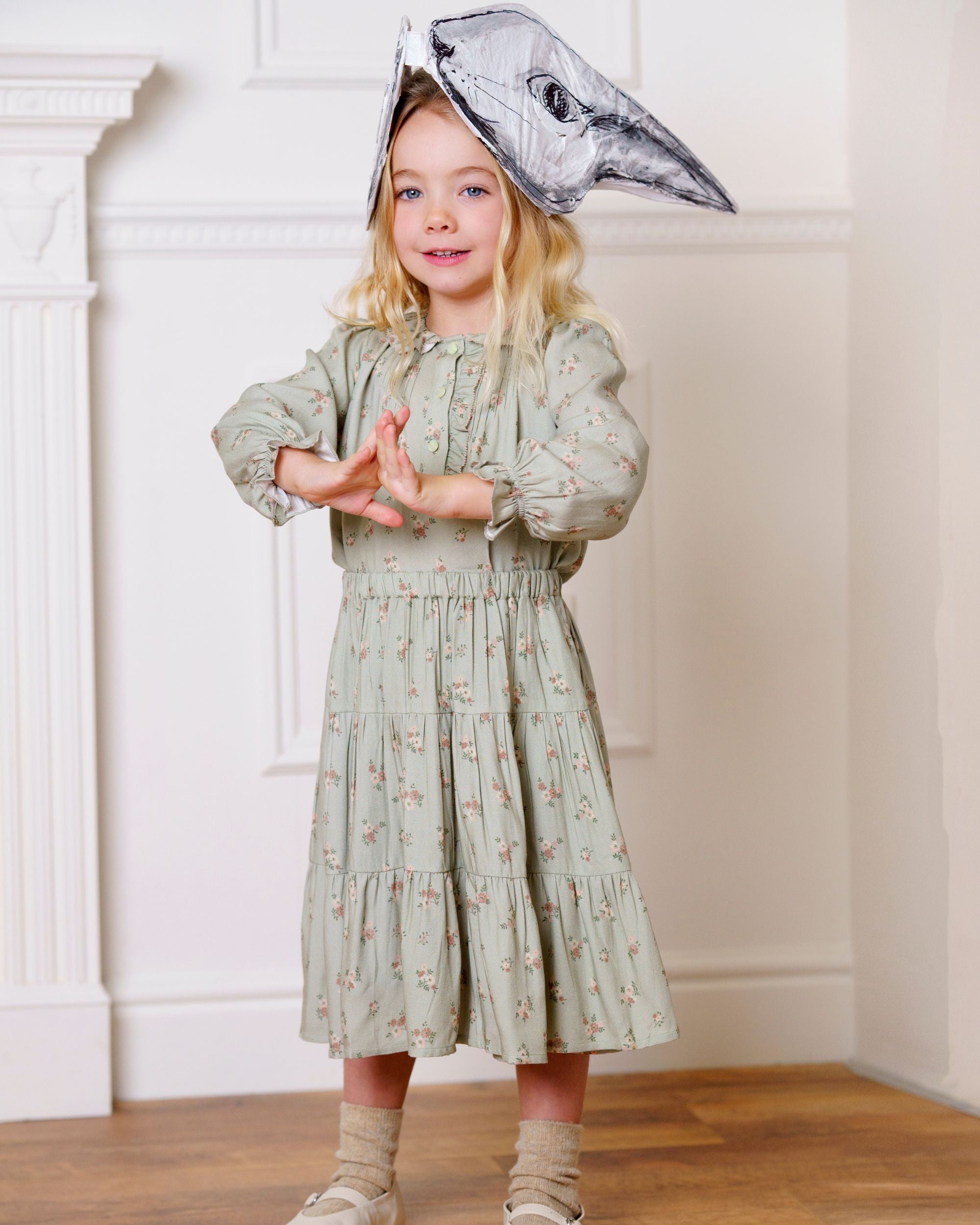 Early Sunday, Victoria Skirt in Ditsy Bouquet Jade print, made from Printed Viscose Rayon Twill fabric, featuring Tiered silhouette for natural movement and volume, shown in a side view of model wearing it