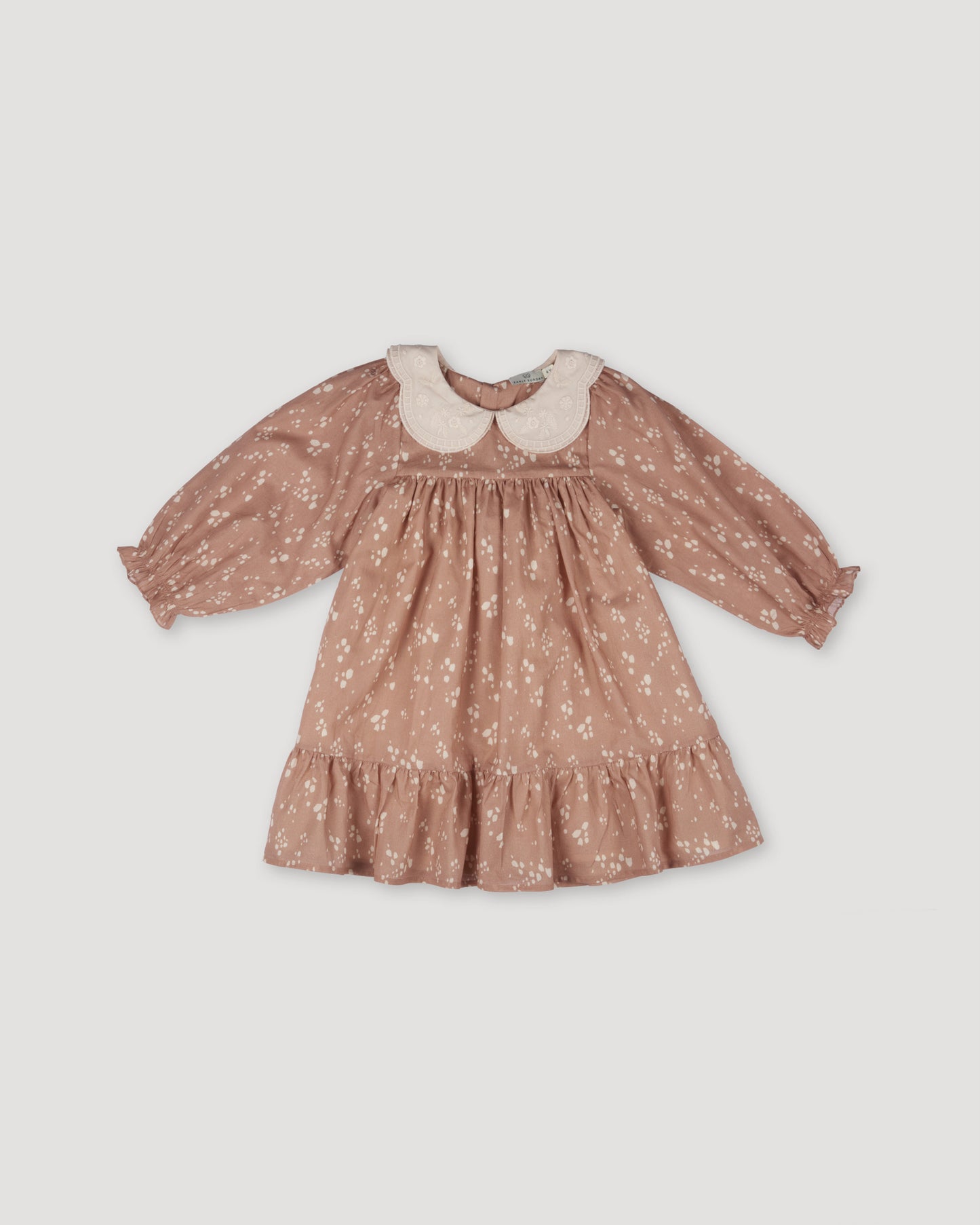 Early Sunday, Virginia Dress in Fawn Soft Pinkish Brown, made from Printed Cotton Cambric fabric, featuring classic silhouette with embroidered collars, shown in a front flat-lay view