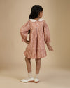 Early Sunday, Virginia Dress in Fawn Soft Pinkish Brown, made from Printed Cotton Cambric fabric, featuring classic silhouette with embroidered collars, shown in a back view of model wearing it