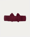 Early Sunday, Wide Bow Head Band in Plum, made from Cotton Double Gauze fabric, featuring a wide bow design, shown in a back flat-lay view