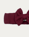 Early Sunday, Wide Bow Head Band in Plum, made from Cotton Double Gauze fabric, featuring a wide bow design, shown in a closeup flat-lay view