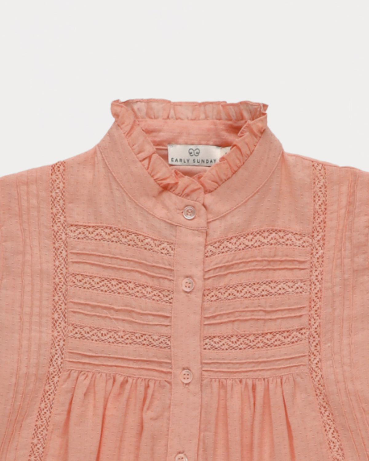Early Sunday, Zoe Shirt in Nude, made from Cotton Jeera Dobby Voile fabric, featuring frilled roundneck with detailed lace yoke, shown in a closeup flat-lay view