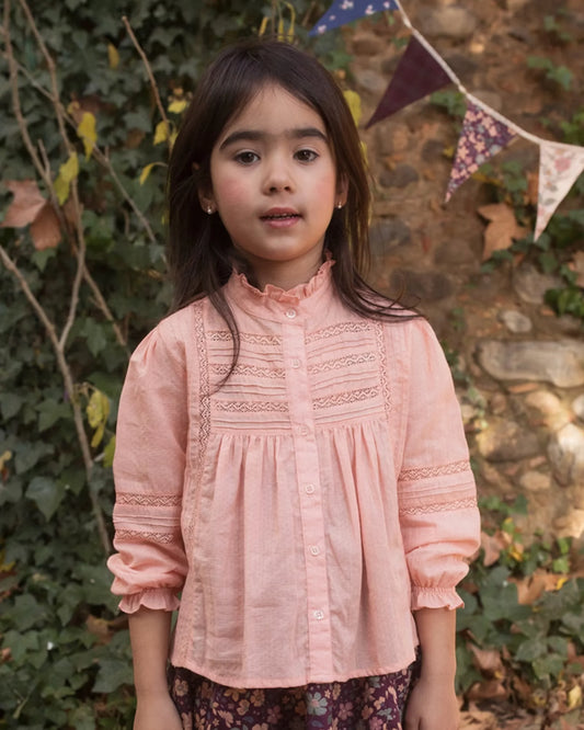Early Sunday, Zoe Shirt in Nude, made from Cotton Jeera Dobby Voile fabric, featuring frilled roundneck with detailed lace yoke, shown in a front view of model wearing outdoors